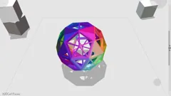 A multicolored geometric shape resting on the 4D Toys tabletop.