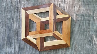 Impossible wooden cube — A real wooden construction looks like an impossible cube from one view.